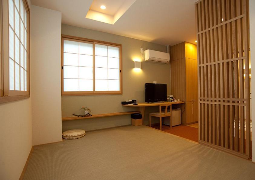 Mizuhasou Hotel Hatsukaichi Værelse billede