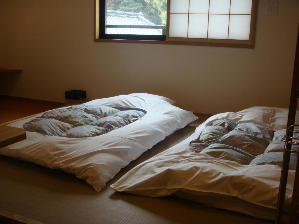 Mizuhasou Hotel Hatsukaichi Værelse billede
